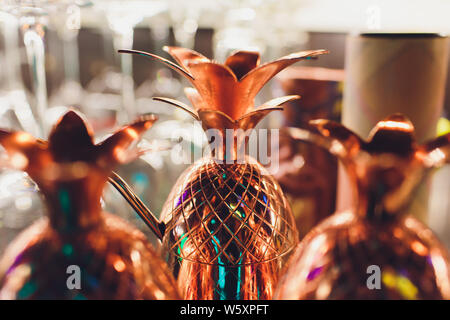 Two cocktails in the pineapple form cups on the bar counter. Stock Photo