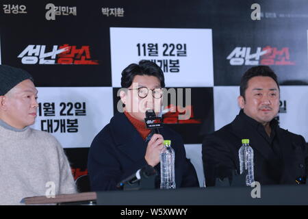 (From left) South Korean actors Park Ji-hwan, Kim Min-jae, and Korean-American actor Ma Dong-seok, also known as Don Lee attend a press conference for Stock Photo