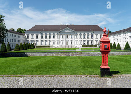 Berlin, Germany 2019-24-07: historic red fire alarm box, street alarm box, outside of Bellevue Palace in Berlin, Germany Stock Photo
