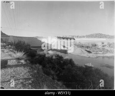 Stewart Mountain Dam. The Stewart Mountain Dam showing the completed spillway discharge channel.; Scope and content:  Photograph from Volume One of a series of photo albums documenting the construction of Roosevelt Dam, Stewart Dam, and other related work on the Salt River Project in Arizona. Stock Photo