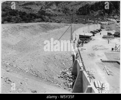 Stewart Mountain spillway. View looking downstream along left wall, showing backfill.; Scope and content:  Photograph from Volume One of a series of photo albums documenting the construction of Roosevelt Dam, Stewart Dam, and other related work on the Salt River Project in Arizona. Stock Photo