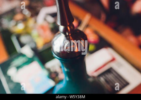 Part of a hookah in the arabic restaurant. Stock Photo