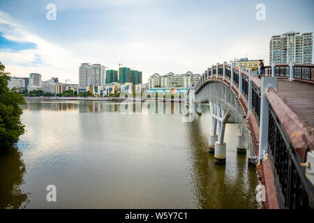 Sanya, Hainan, China - 26.06.2019: Pedestrian bridge over the River in Sanya, Hainan, China Stock Photo