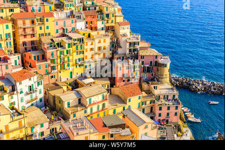 Colorful houses in Manarola Village in Cinque Terre National Park. Beautiful scenery at coast of Italy. Fisherman village in the province of La Spezia