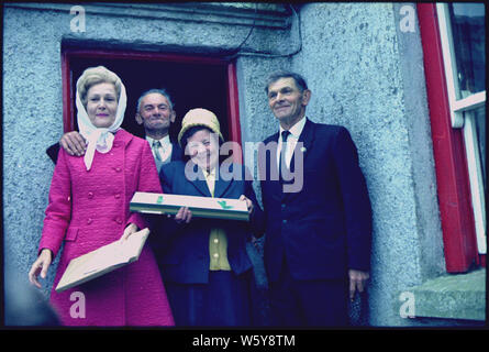 The First Lady poses with some villagers in Ireland; Scope and content:  Pictured: Mrs. Pat Nixon, others pictured are not identified. Subject: European Trip- 1970. Stock Photo