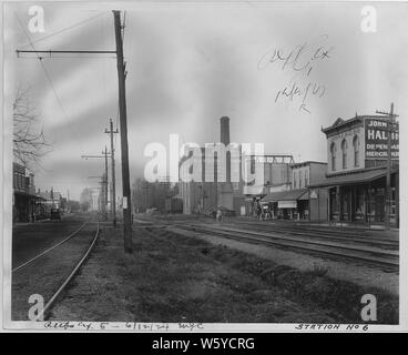 Town of Haubstadt, Indiana; Scope and content:  Various street scenes showing the John F. Halbig General Merchandise store, other businesses, railroad tracks, Model T car, and horse and buggy. In photo #94 the date on the Halbig building is 1877. Stock Photo