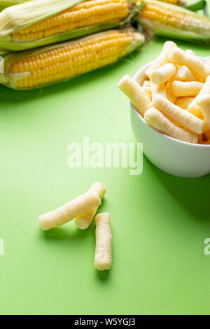 Puffelets Snack Corn puffs over a white background Stock Photo - Alamy