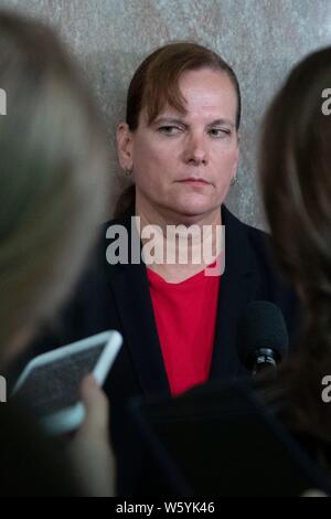 United States Army Colonel Kathryn Spletstoser who has said she was sexually assaulted by US Air Force General John E. Hyten, who is nominated to become Vice Chairman Of The Joint Chiefs Of Staff, speaks to the media following his confirmation hearing before the US Senate Armed Services Committee, on Capitol Hill in Washington, DC on July 30, 2019. Credit: Stefani Reynolds/CNP | usage worldwide Stock Photo