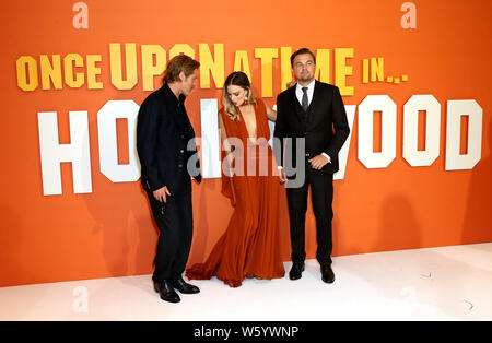 Brad Pitt, Margot Robbie and Leonardo DiCaprio attending the Once Upon A Time... In Hollywood UK premiere in Leicester Square, London. Stock Photo