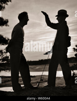1950s ANONYMOUS SILHOUETTE OF TWO MEN ONE WEARING HAT HOLDING FISHING ROD  TELLING THE STORY OF THE BIG ONE THAT GOT AWAY - ka1570 HAR001 HARS ROD  SILHOUETTES HUMOROUS SIZE ADVENTURE LEISURE