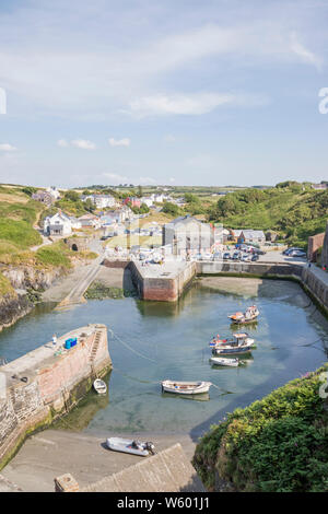 The harbour at Porthgain a coastal village within the Pembrokeshire Coast National Park, Wales, UK Stock Photo