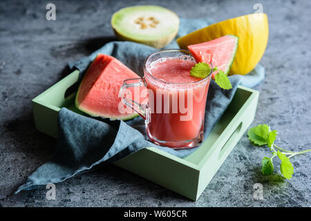 Cold summer drink, refreshing juice made from three types of watermelon Stock Photo
