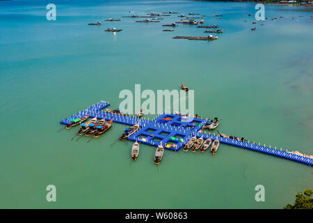 Aerial view of traditional wooden fishing boats in Thailand Stock Photo