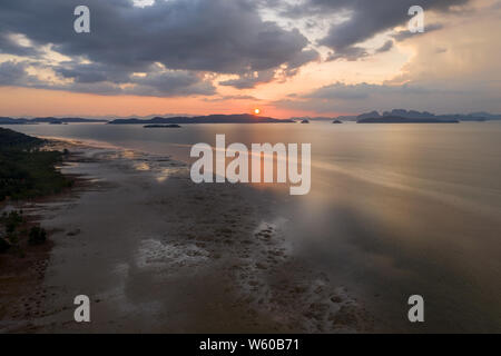 Aerial view of a beautiful tropical sunset from Koh Yao Noi island, Thailand Stock Photo