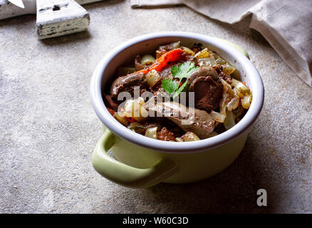 Stewed chicken liver with vegetables Stock Photo
