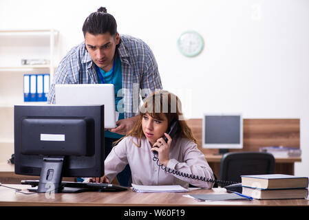 The young male it specialist in the office Stock Photo