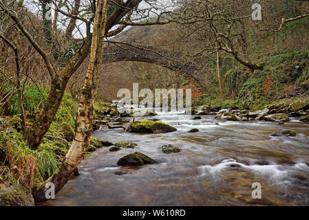 UK,North Devon,Exmoor,Footbridge over East Lyn River Stock Photo