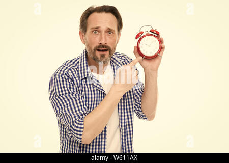 Man bearded mature guy hold alarm clock. Time management skill. Take control of time. Self discipline concept. How to avoid being late. Being late is habit. Figure out why you are always late. Stock Photo