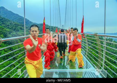 Kung fu enthusiasts perform Chinese Kung fu to mourn famous Chinese martial arts novelist Louis Cha Leung-yung, more widely known by his pen name Jin Stock Photo