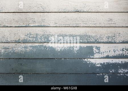 Closeup shot of half-painted wooden planks Stock Photo