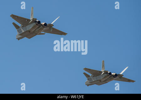 A J-20 stealth fighter jet of the Chinese PLA (People's Liberation Army) Airforce flies during a training session in preparation for the 12th China In Stock Photo