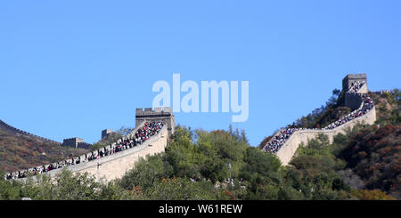 Crowds of Chinese tourists visit the Badaling Great Wall during the week-long National Day holiday in Beijing, China, 3 October 2018.   A total of 502 Stock Photo