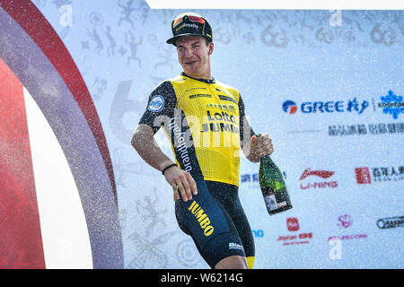 Dutch road racing cyclist Dylan Gr-enewegen who rides for the Dutch UCI WorldTeam LottoNL¨CJumbo celebrates after winning the Beihai Stage Race during Stock Photo