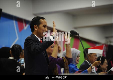 Indonesian President Joko Widodo attends the opening ceremony of the 3rd Asian Para Games at GBK Main Stadium in Jakarta, Indonesia, 6 October 2018. Stock Photo