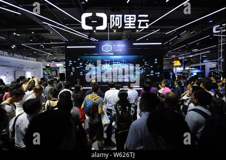 --FILE--People visit the stand of Alibaba Cloud, or Aliyun.com, the online cloud computing unit of Alibaba Group, during the Computing Conference 2018 Stock Photo