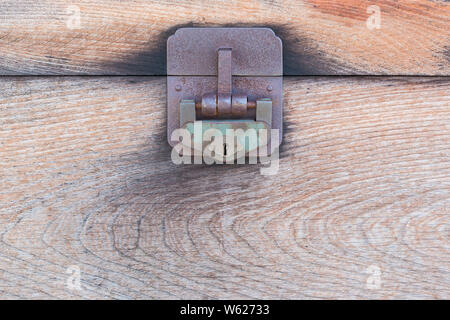 Detail of the lock on an old wooden chest, Close up Stock Photo