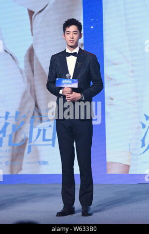 Chinese actor Connor Leong or Liang Jingkang of the new lineup of Chinese boy group F4 attends a press conference for the broadcast of the TV series ' Stock Photo