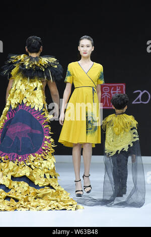 Models display new creations at the Dream x Classic of Mountains and Seas fashion show during the 2018 Beijing Fashion Week in Beijing, China, 21 Sept Stock Photo