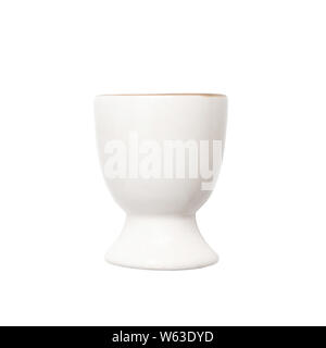 white bowl on the leg with gold border. Egg stand. Stock Photo
