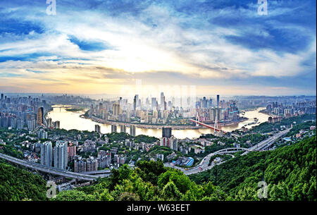 Skyline of Yuzhong Peninsula with skyscrapers and high-rise buildings in Jiefangbei CBD, also known as Jiefangbei Commercial Walking Street, in Chongq Stock Photo