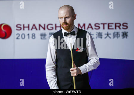 Anthony McGill of Scotland considers a shot to Mark Williams of Wales in their second round match during the 2018 Shanghai Masters snooker tournament Stock Photo
