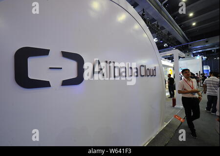 --FILE--People visit the stand of Alibaba Cloud, or Aliyun.com, the online cloud computing unit of Alibaba Group, during the Computing Conference 2018 Stock Photo