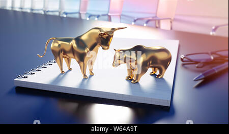 Bull and bear on a notebook in ameeting room - Bulle und Bär Stock Photo