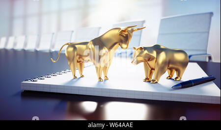 Bull and bear on a notebook in ameeting room - Bulle und Bär Stock Photo