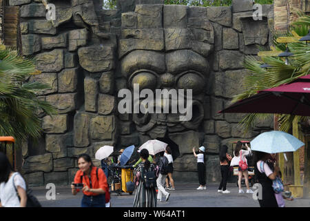 Tourists visit a replica of Cambodia's Angkor Wat temple complex at a tourist attraction in Nanning city, south China's Guangxi Zhuang Autonomous Regi Stock Photo