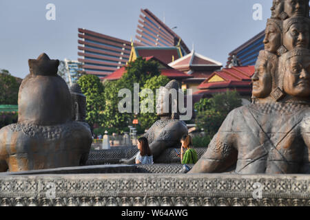 Tourists visit a replica of Cambodia's Angkor Wat temple complex at a tourist attraction in Nanning city, south China's Guangxi Zhuang Autonomous Regi Stock Photo