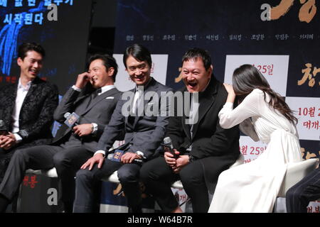 (From left) South Korean actors Hyun Bin, Jang Dong-gun, Jo Woo-jin, Jeong Man-sik, and singer and actress Lee Sun-bin, attend a press conference for Stock Photo