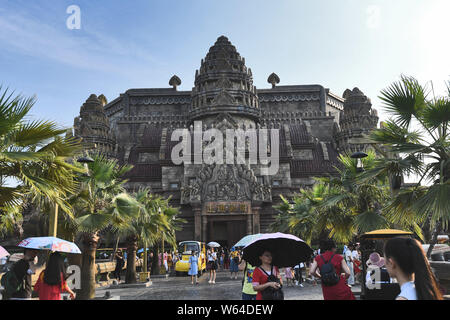 Tourists visit a replica of Cambodia's Angkor Wat temple complex at a tourist attraction in Nanning city, south China's Guangxi Zhuang Autonomous Regi Stock Photo