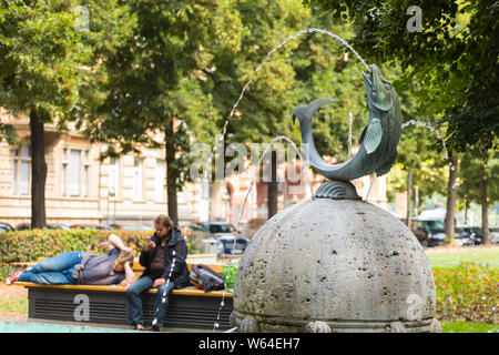 Man With Fish Sculpture And Fountain In Chicago Illinois Stock Photo Alamy 