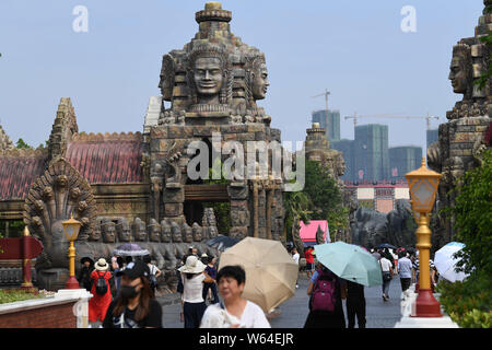 Tourists visit a replica of Cambodia's Angkor Wat temple complex at a tourist attraction in Nanning city, south China's Guangxi Zhuang Autonomous Regi Stock Photo