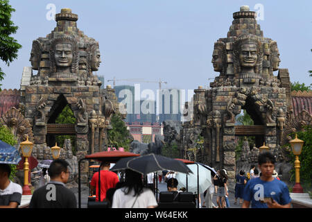 Tourists visit a replica of Cambodia's Angkor Wat temple complex at a tourist attraction in Nanning city, south China's Guangxi Zhuang Autonomous Regi Stock Photo