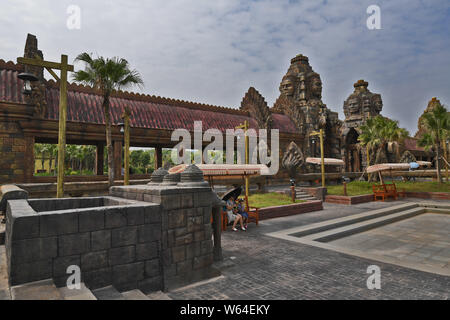 Tourists visit a replica of Cambodia's Angkor Wat temple complex at a tourist attraction in Nanning city, south China's Guangxi Zhuang Autonomous Regi Stock Photo