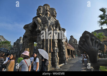 Tourists visit a replica of Cambodia's Angkor Wat temple complex at a tourist attraction in Nanning city, south China's Guangxi Zhuang Autonomous Regi Stock Photo