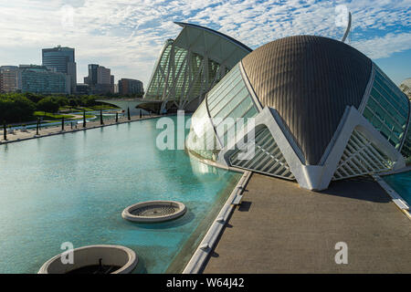 JULY 27, 2019 - VALENCIA, SPAIN. The Hemisferic Planetarium (1998) with the Prince Felipe Science Museum (2000) behind are part of the CIty of Arts an Stock Photo
