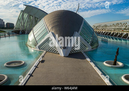 JULY 27, 2019 - VALENCIA, SPAIN. The Hemisferic Planetarium (1998) with the Prince Felipe Science Museum (2000) behind are part of the CIty of Arts an Stock Photo