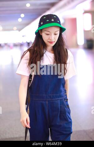 Chinese actress Ni Ni arrives at the Shanghai Hongqiao International ...